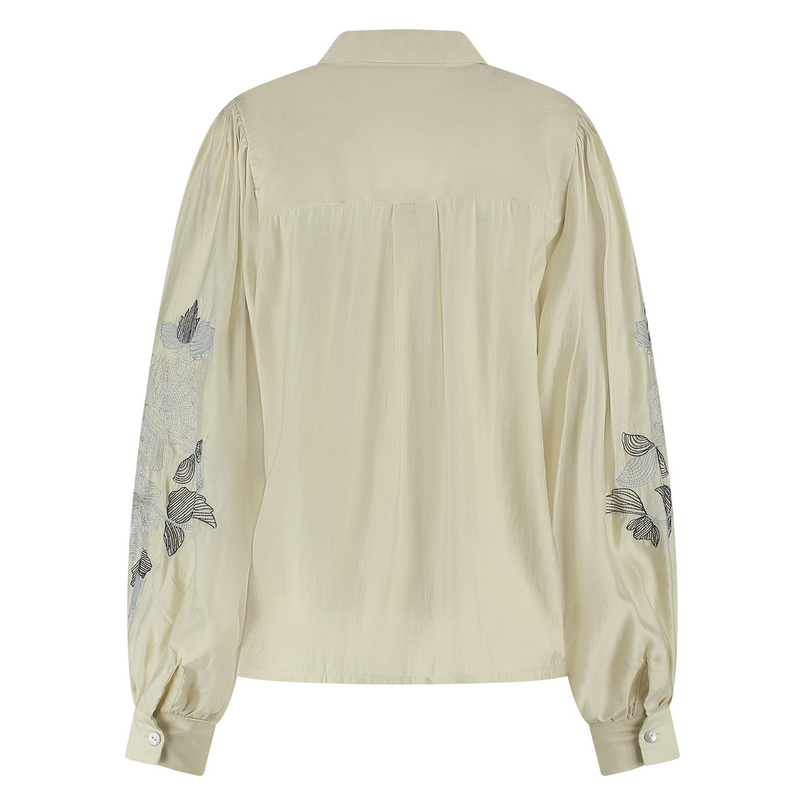 Nukus Dames blouse met embroidery op mouw Off-white